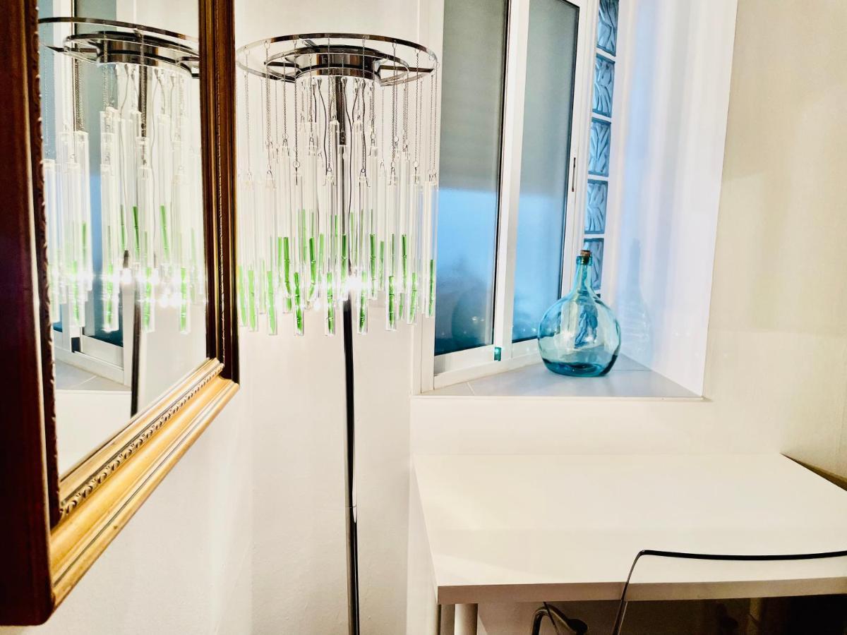 Apartamento Puerta Carmona Sevilla Bagian luar foto
